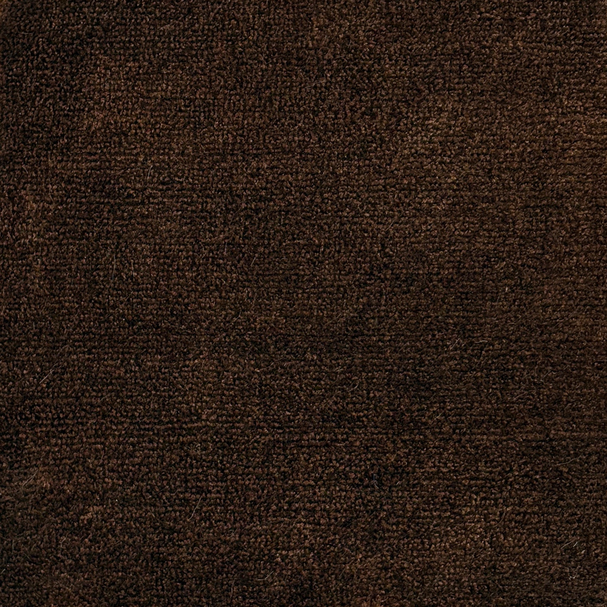 Handknotted rug solid cut pile in brown. 