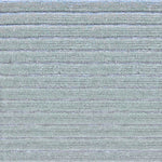 Detail of a handknotted rug in a raised stripe pattern in light grey