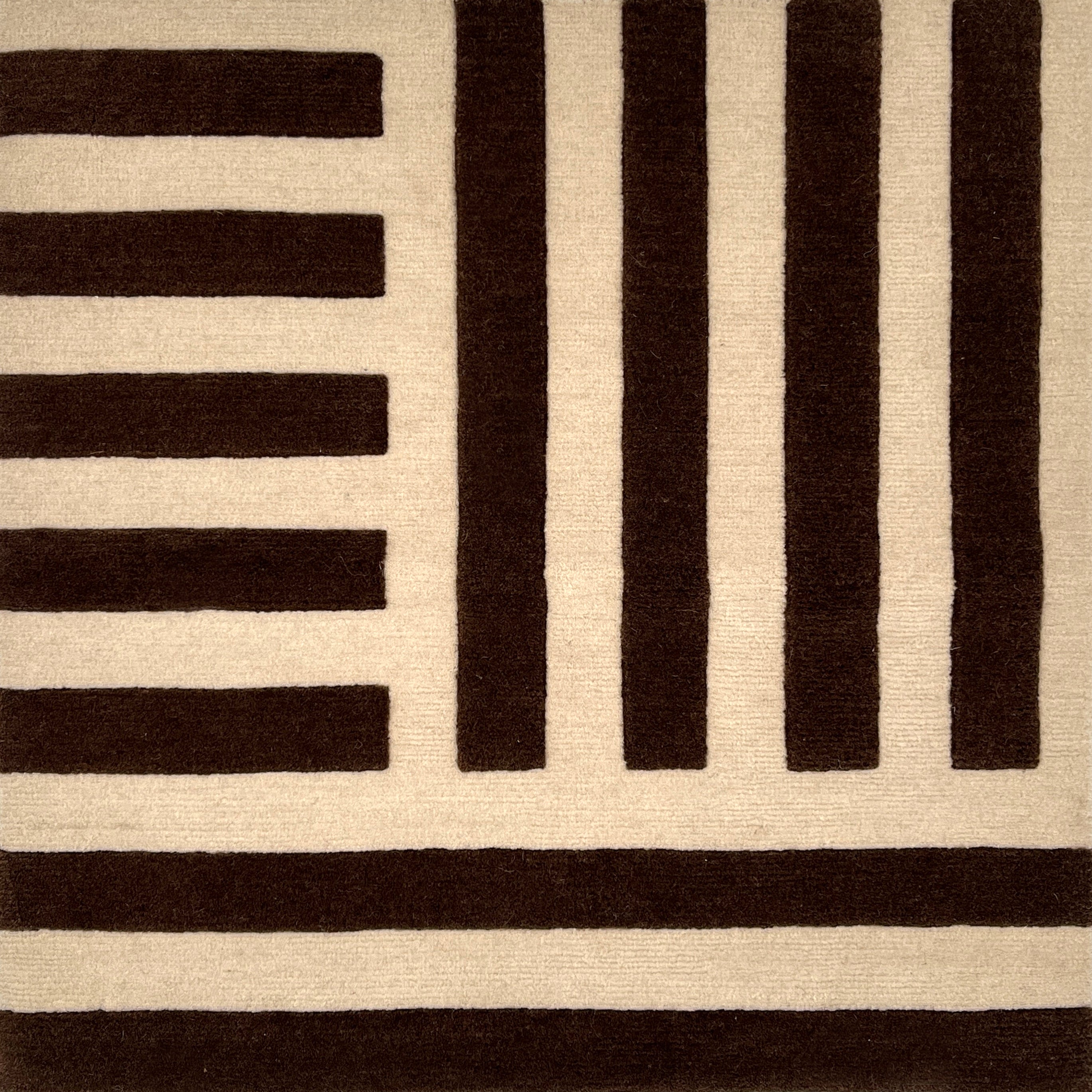 Rug with black and beige striped pattern