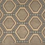 Detail of a hexagonal patterned rug in brown and gray tones