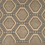 Detail of a hexagonal patterned rug in brown and gray tones