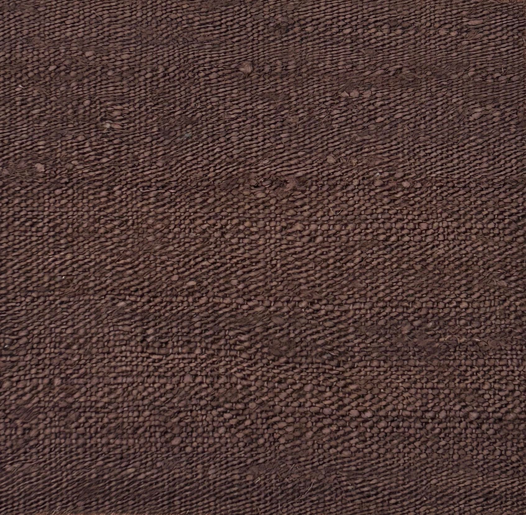 Handwoven carpet in solid brown