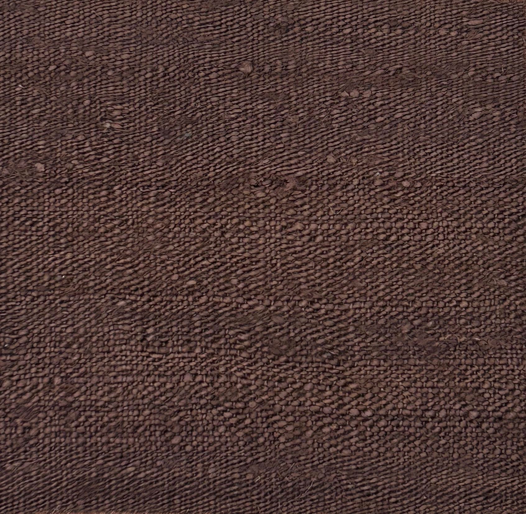 Handwoven carpet in solid brown
