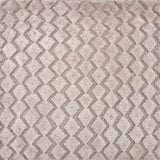 Detail of a hand knotted rug with a raised cut pile diamond stripe in grey.