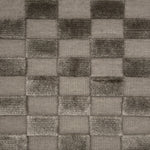 Handwoven rug with raised checkerboard cut pile squares in grey