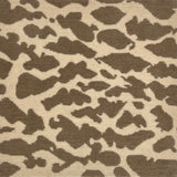 Handknotted rug with giraffe spot motif in light brown on cream. 