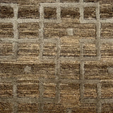 Close-up of a textured brown and beige carpet with a checkered pattern