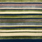 Striped rug with a pattern of green, blue, and beige stripes on a dark blue background.