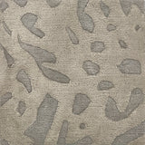 Handknotted rug with abstract animal motif in tonal grey. 