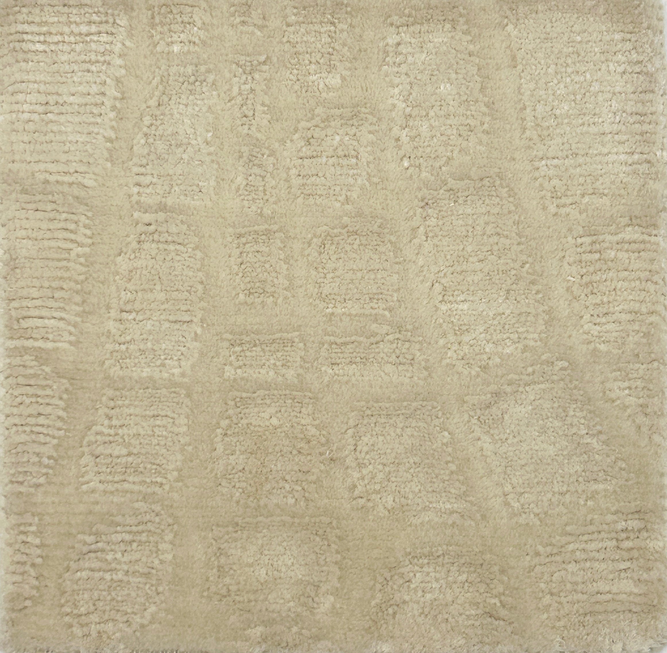 Textured beige carpet with a subtle pattern
