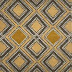 Handknotted rug in a diamond pattern in grey, cream and yellow on a tan field. 
