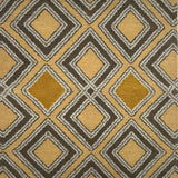 Handknotted rug in a diamond pattern in grey, cream and yellow on a tan field. 
