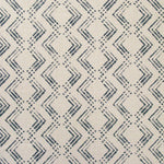 Fabric in a diamond grid pattern in navy on a tan field.
