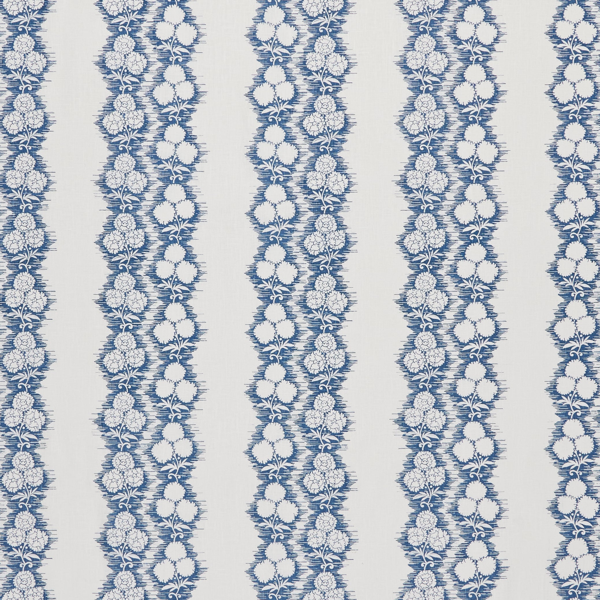 Fabric in a botanical stripe print in blue on a white field.