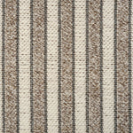 Broadloom carpet with stripes of cream and brown.