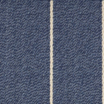 Broadloom carpet in a thin ivory stripe on a field of marine blue. 