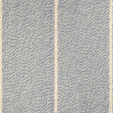 Broadloom carpet in a thin ivory stripe on a field of light blue.