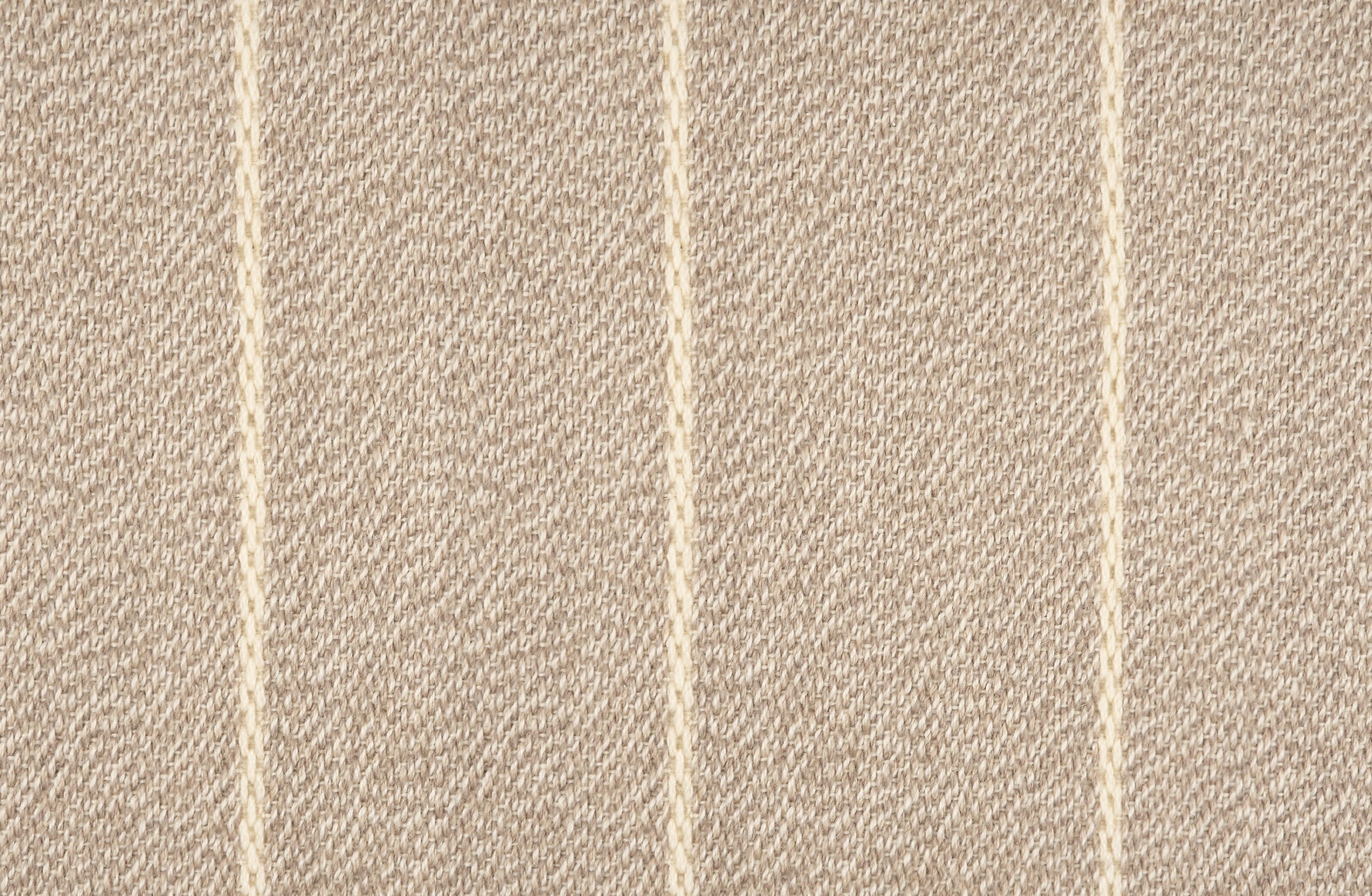 Broadloom carpet in a thin ivory stripe on a field of taupe.
