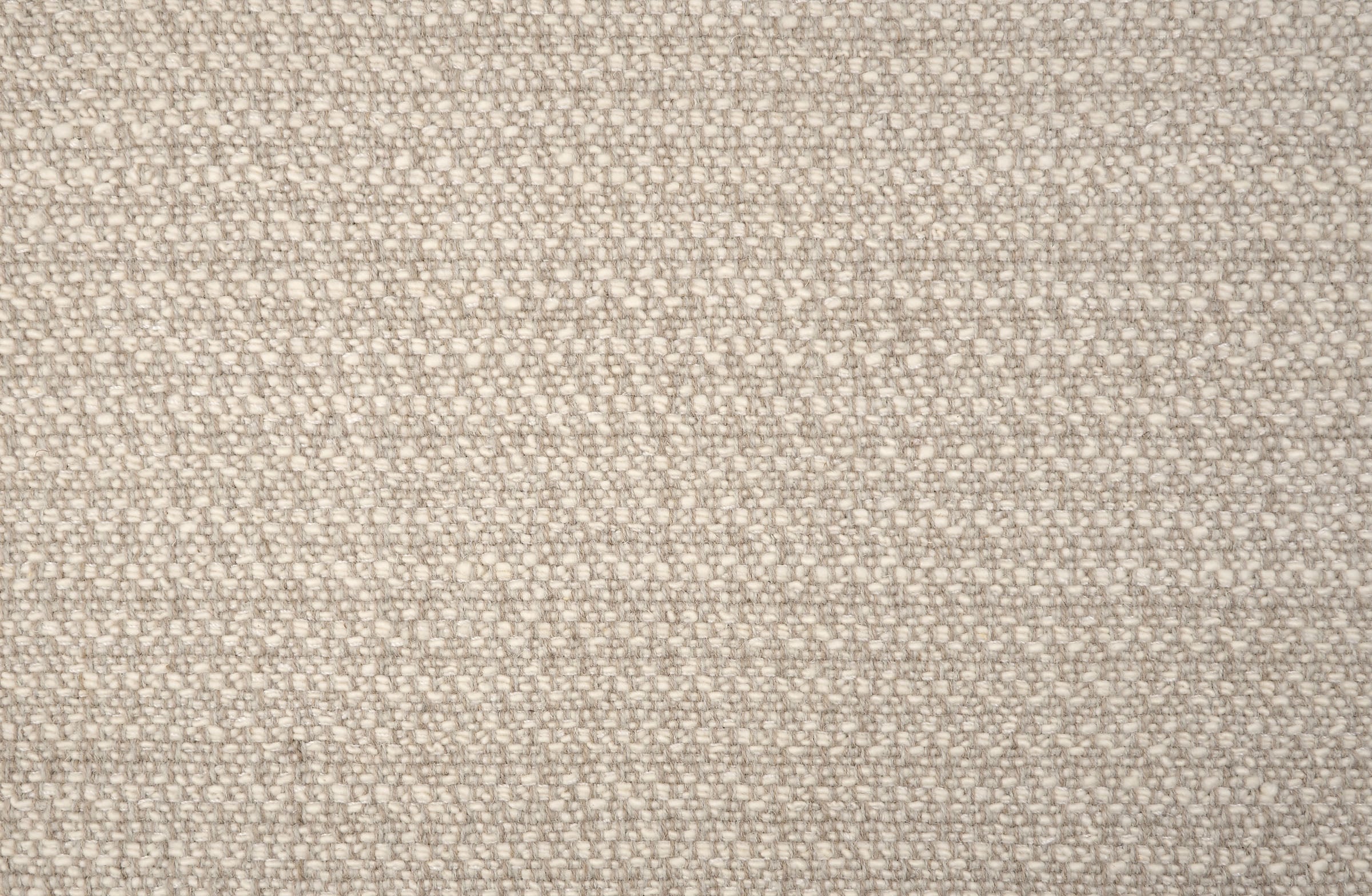 Textured broadloom carpet in ecru.