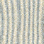 Textured woven outdoor carpet in slate blue and beige.