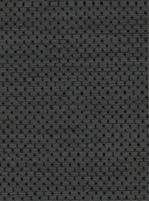 Detail of a paperweave grasscloth wallpaper in mottled charcoal.