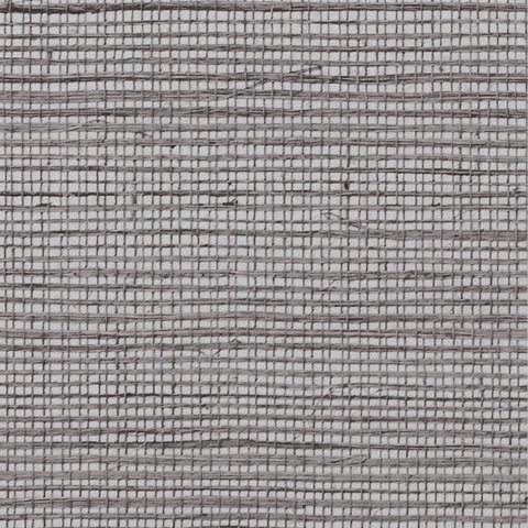 Detail of a sisal grasscloth wallpaper in charcoal on a light gray paper backing.