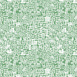 Hand drawn Greek Key pattern in white on green.