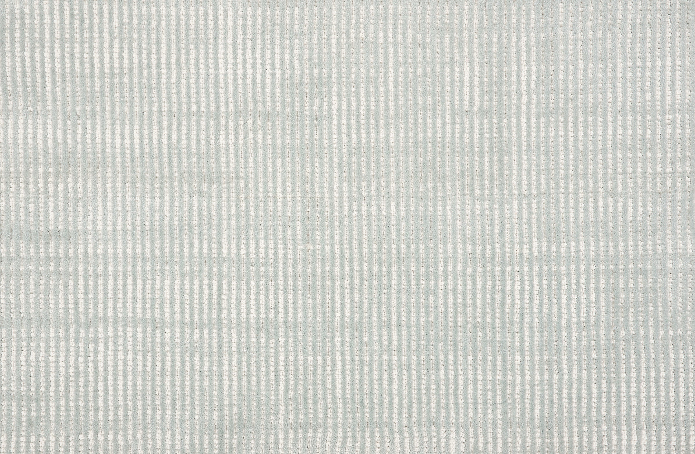 Broadloom carpet sample in a thin ribbed stripe in cool light blue.