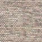 A rug woven in rows with yard that is a melange of ivory and grey.