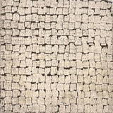 A rug with irregular squares generally in stripes with a brown ground and ivory squares.