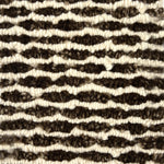 Handknotted rug in a wavy stripe in chocoliate brown and cream. 