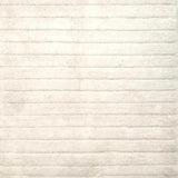 Handknotted custom rug with ribbed cut pile stripes in white wool. 