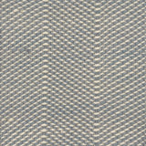 Flatweave rug with grey and white twisted yarns in a herringbone pattern. 