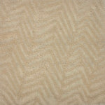 Handknotted rug with a tonal zig zag stripe in shades of cream. 