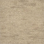 Handknotted rug with subtle texture in cream wool