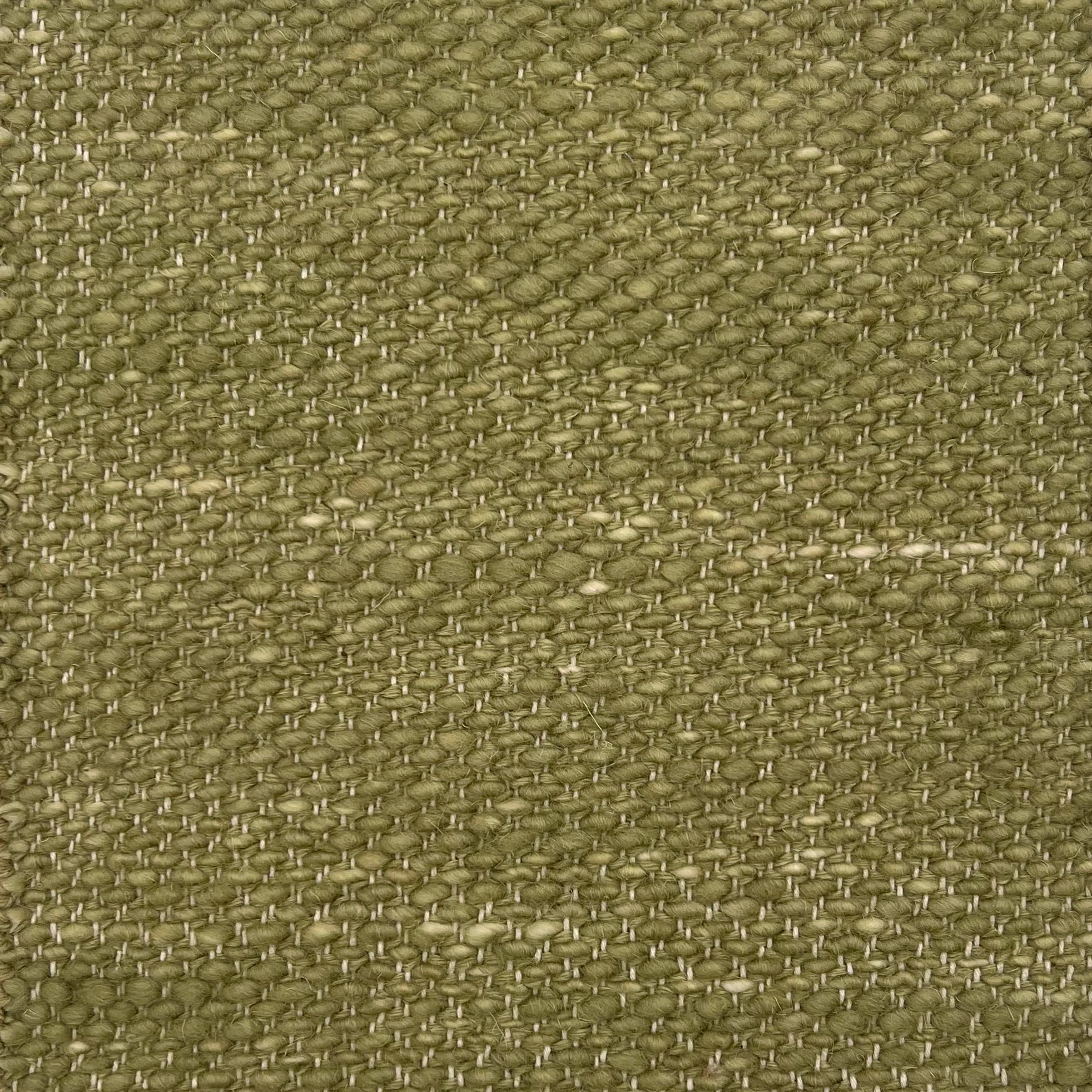 Flatwoven sage green rug. 