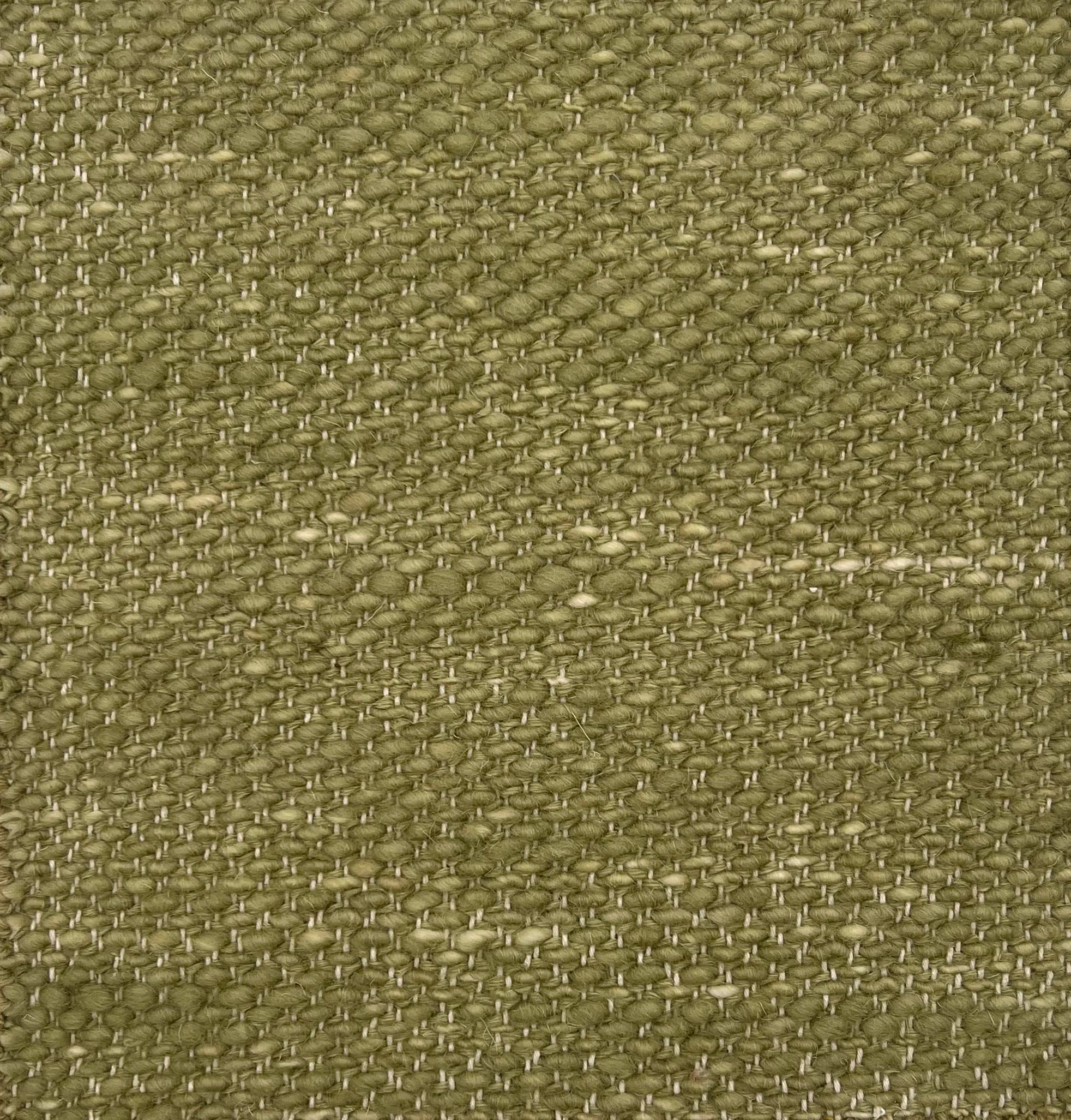 Flatwoven sage green rug. 