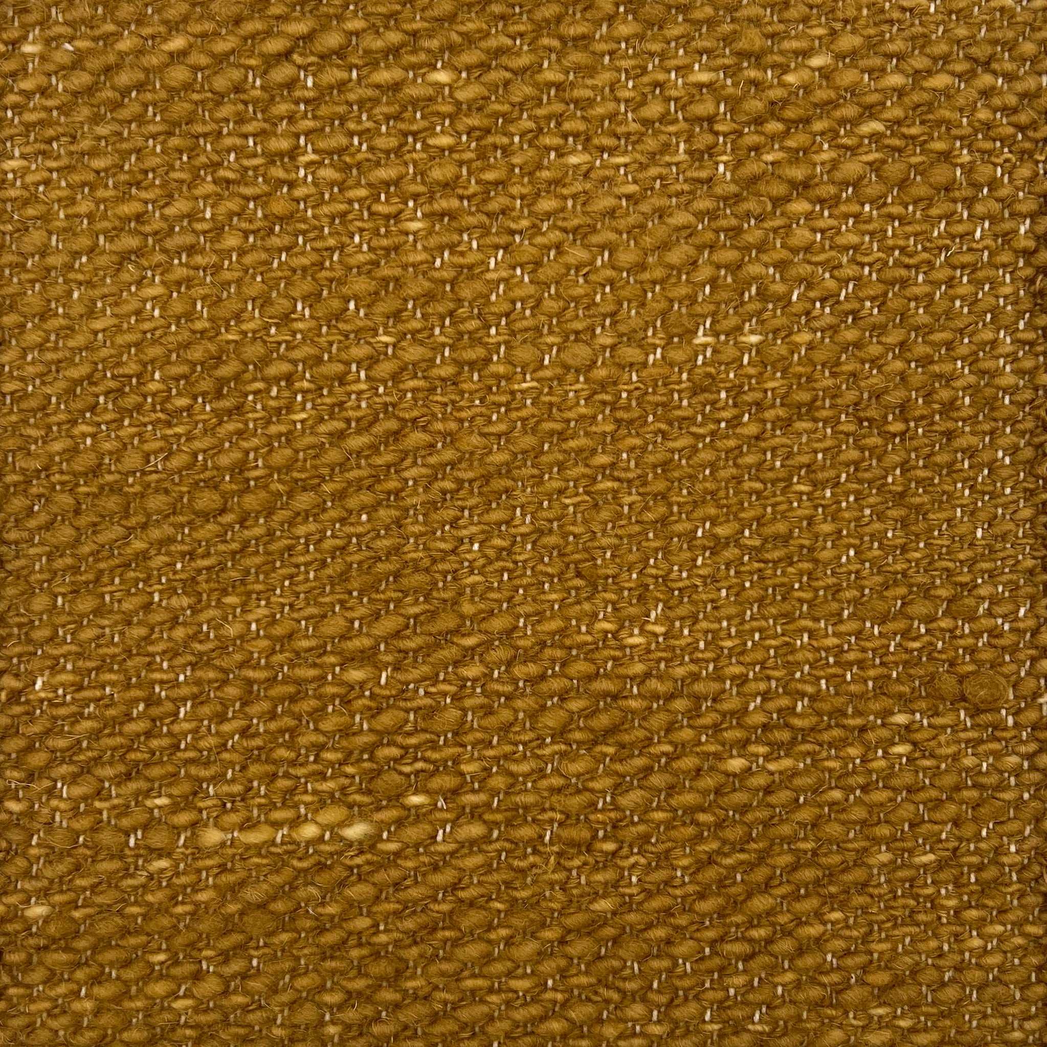 Flatwoven rug in ochre in a textural weave. 