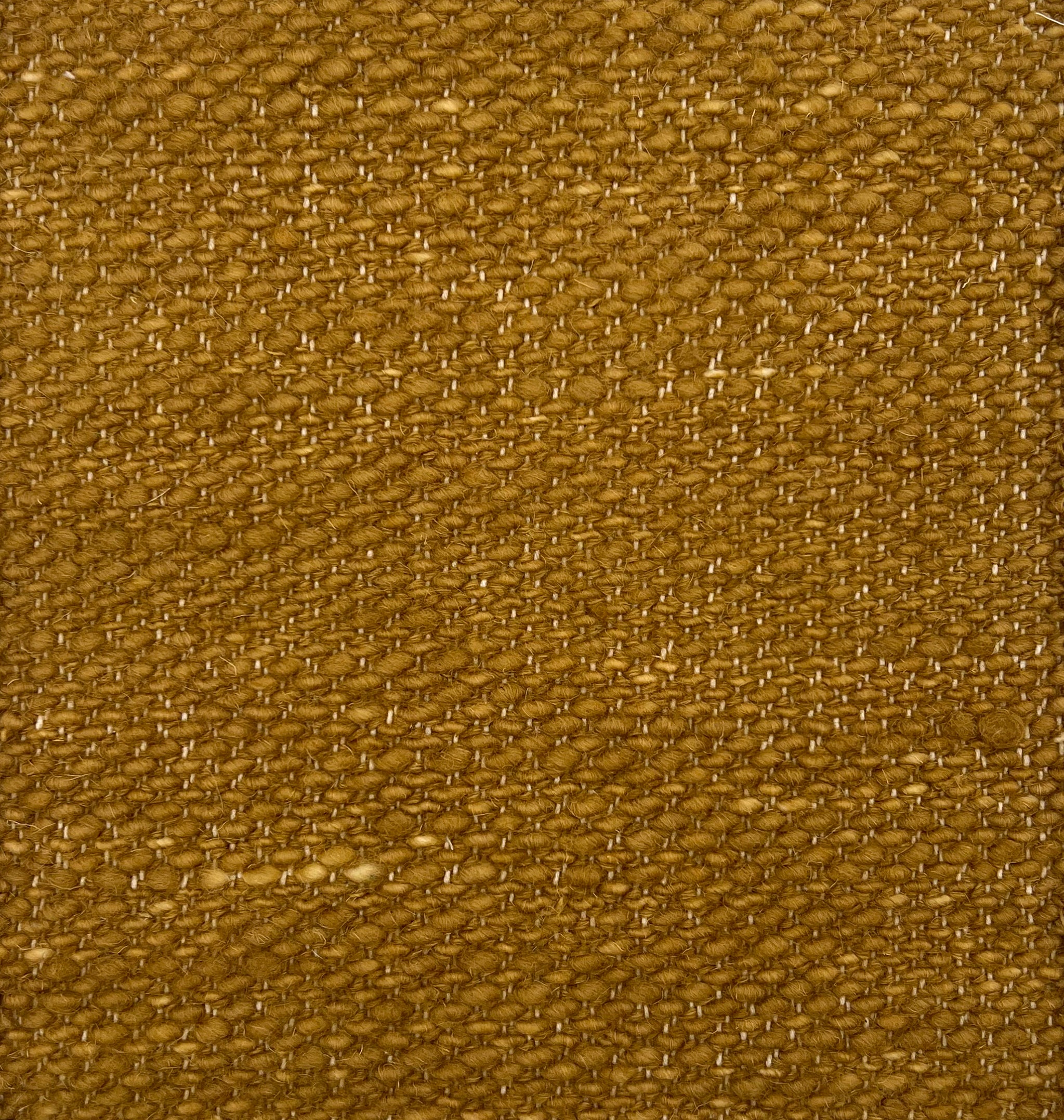 Flatwoven rug in ochre in a textural weave. 