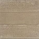 Handknotted rug with a wide raised cut pile stripe in ivory. 