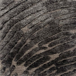 Handknotted rug with a raised abstract linear design in shades of grey. 