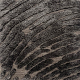 Handknotted rug with a raised abstract linear design in shades of grey. 