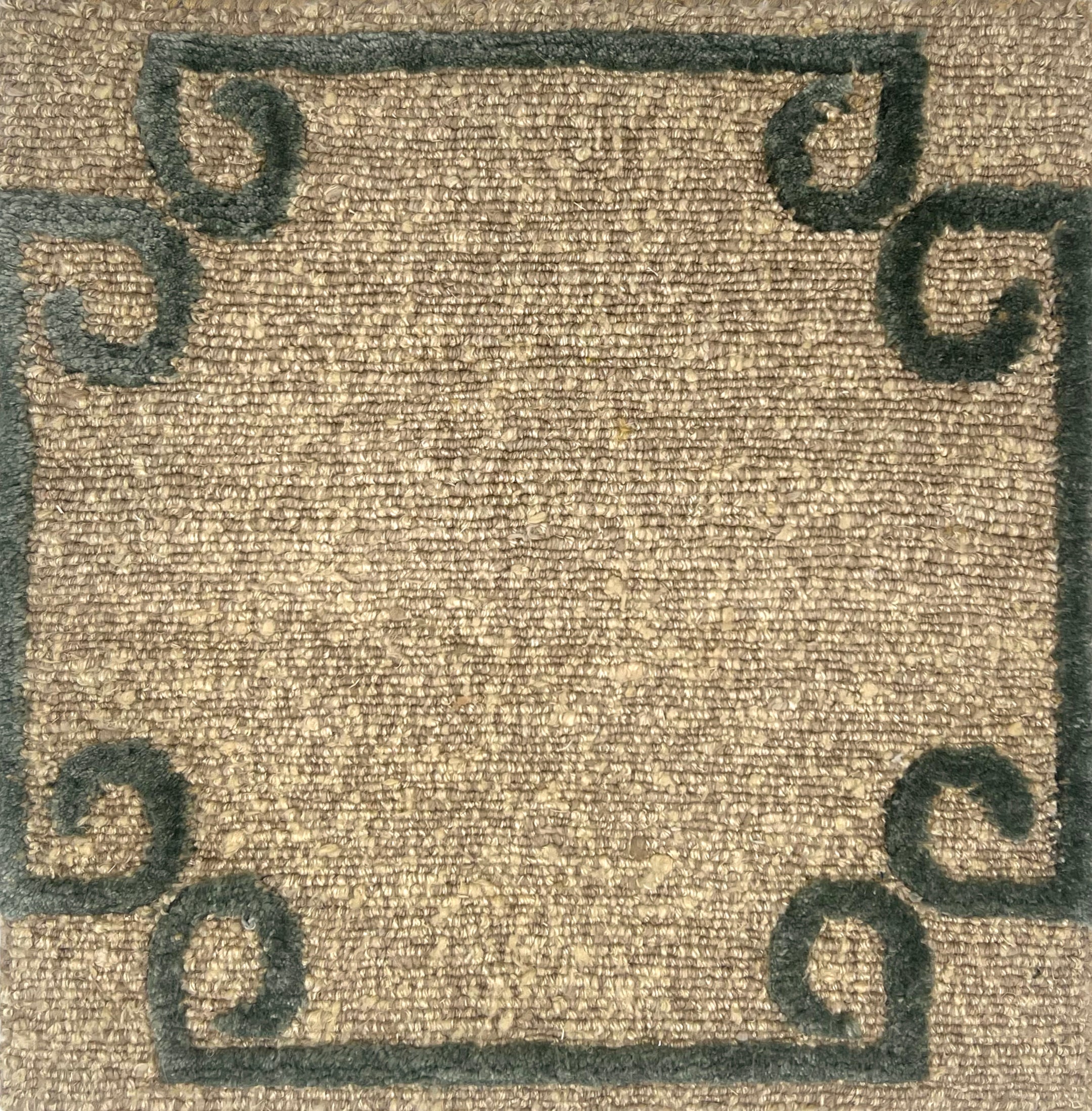 Hand knotted rug in a strie taupe field with a sage green raised curled corner border. 