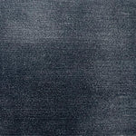 Handknotted cut pile solid rug in navy blue.