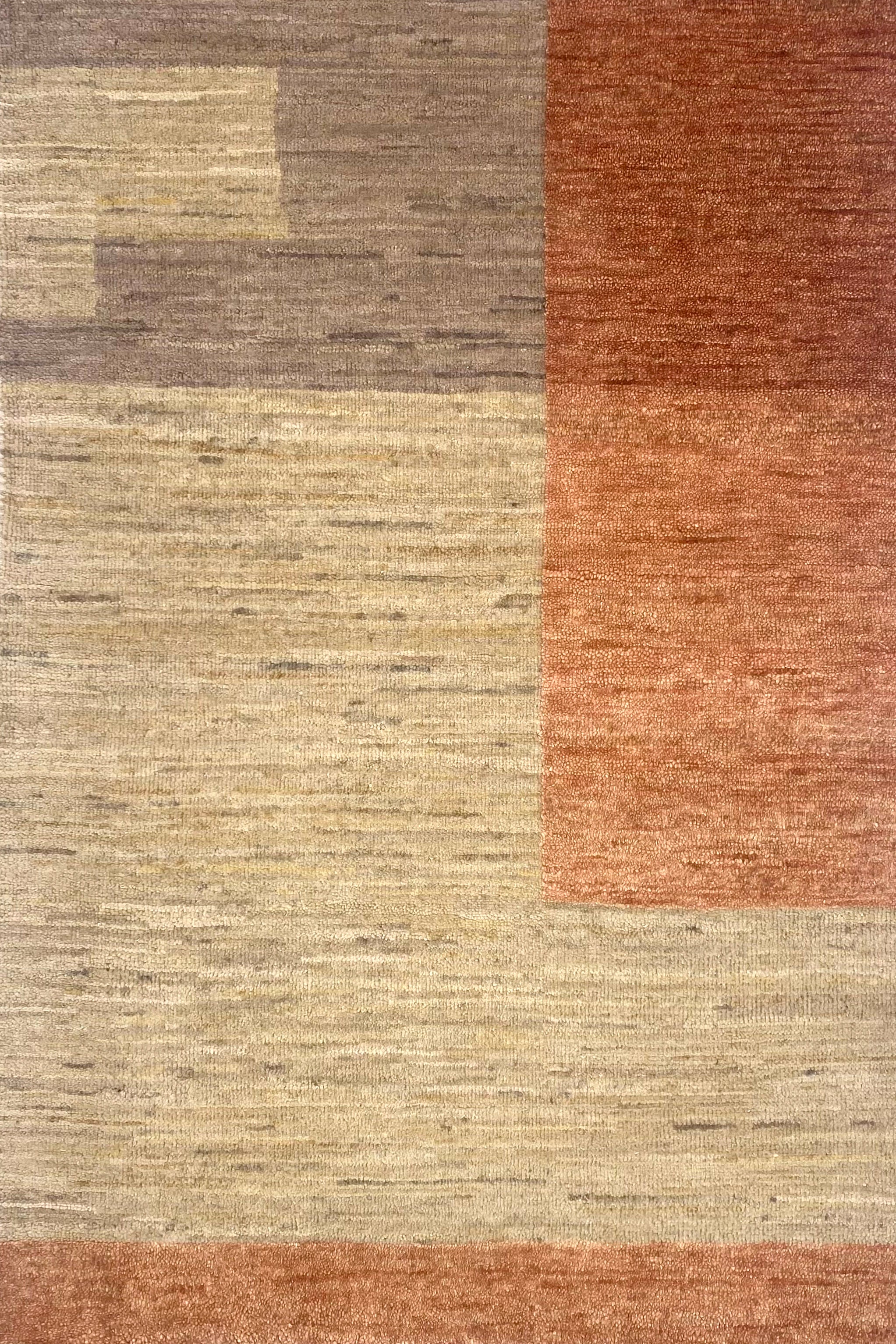 Textured area rug with a pattern of brown and beige colors