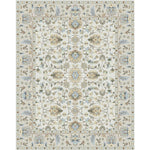 Handmade rug in an intricate floral damask in pastel tones on white. 