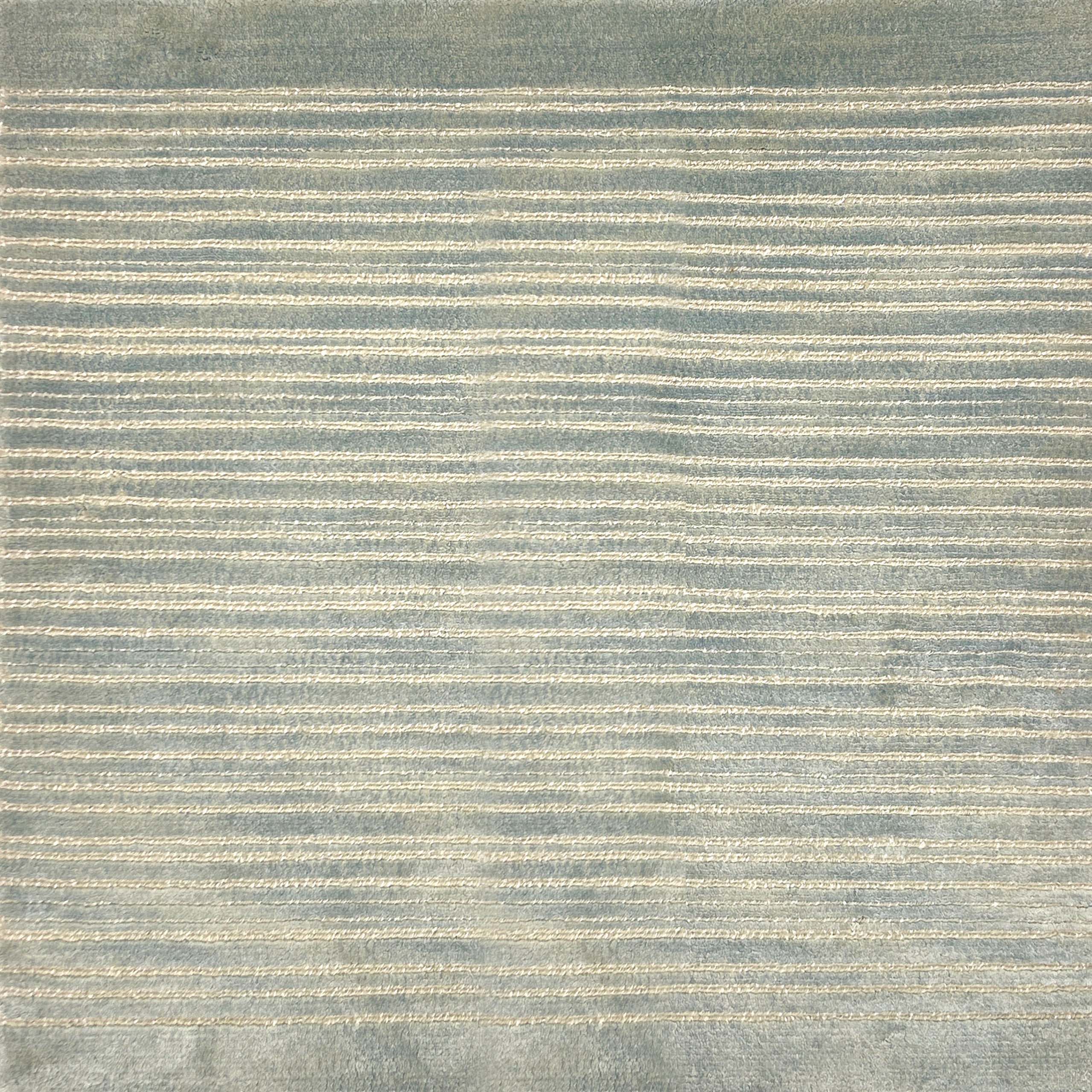 Handknotted rug with horizontal stripes in gray and beige