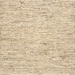 Close up of a rug in a sumak weave in cream
