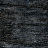 Close up of a rug in a sumak weave in navy blue.