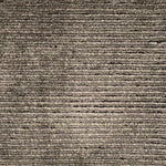 Handknotted cutpile rug in warm grey.